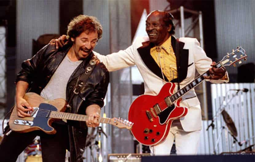 Bruce Springstein and Chuck Berry performing Johnny B. Good at the Rock & Roll Hall of Fame in 1995