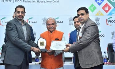 Mr Sandeep Sabharwal, CEO SLCM Group receiving the 2nd FICCI - Sustainable Agriculture Awards 2022 from the MoA&FW, Shri N S Tomar