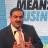 Adani repays $2.15 bn loan taken pledging shares, prepays another $500 mn loan for Ambuja cement