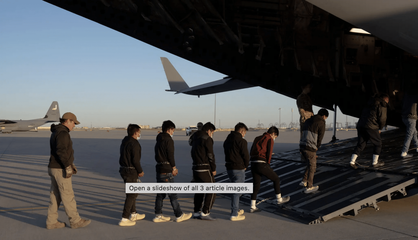 U.S. Customs and Border Protection agents guiding undocumented migrants onto a U.S Air Force C-17 Globemaster III transport aircraft for deportation to Guatemala 3On Sunday alone, ICE made 956 arrests.