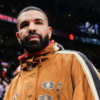 Drake Settles With iHeartMedia Amid Payola Allegations Over “Not Like Us” Universal Music Group UMG