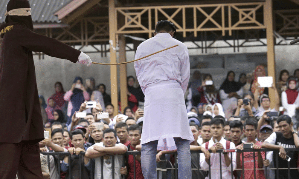 Public Caning of Two Men in Indonesia for Hugging and Kissing Sparks Global Outcry Aceh Shariah Law