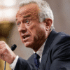 RFK Jr. Sparks Vaccine Policy Uproar COVID Shots Restricted, Experts Warn of Outbreak Risks Autism Registry Robert F. Kennedy Jr.