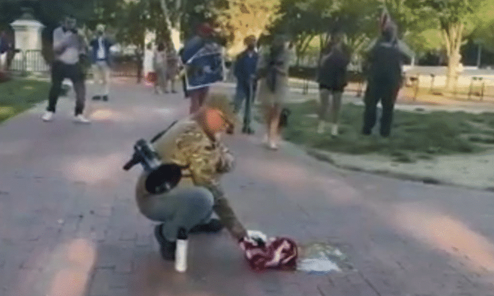 Veteran Burns American Flag Outside White House as Trump Signs Controversial Executive Order