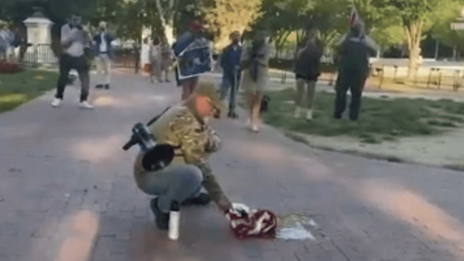 Veteran Burns American Flag Outside White House as Trump Signs Controversial Executive Order