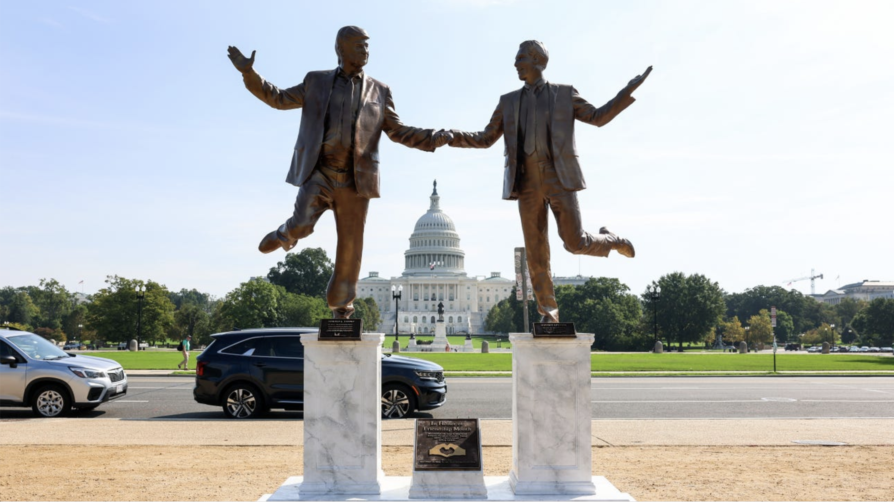 Trump-Epstein Statue Removed From National Mall After Stirring Uproar Secret Handshake project friendship