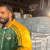 Drake Sparks Frenzy With Ice-Themed Music Video Shoot in Toronto Iceman Green Bay Packers jacket to troll Caleb Williams