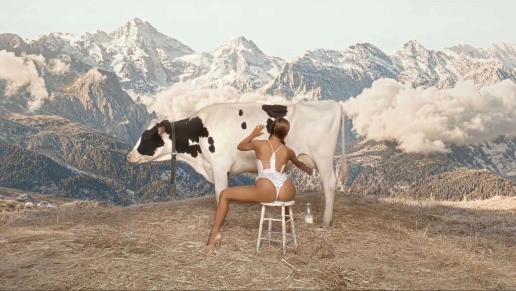 Bianca Censori Milking a Cow in Gemini Season Music Video