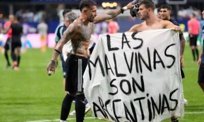 Argentina Players Display Falklands Banner After England World Cup Win Lisandro Martínez and Giovani Lo Celso